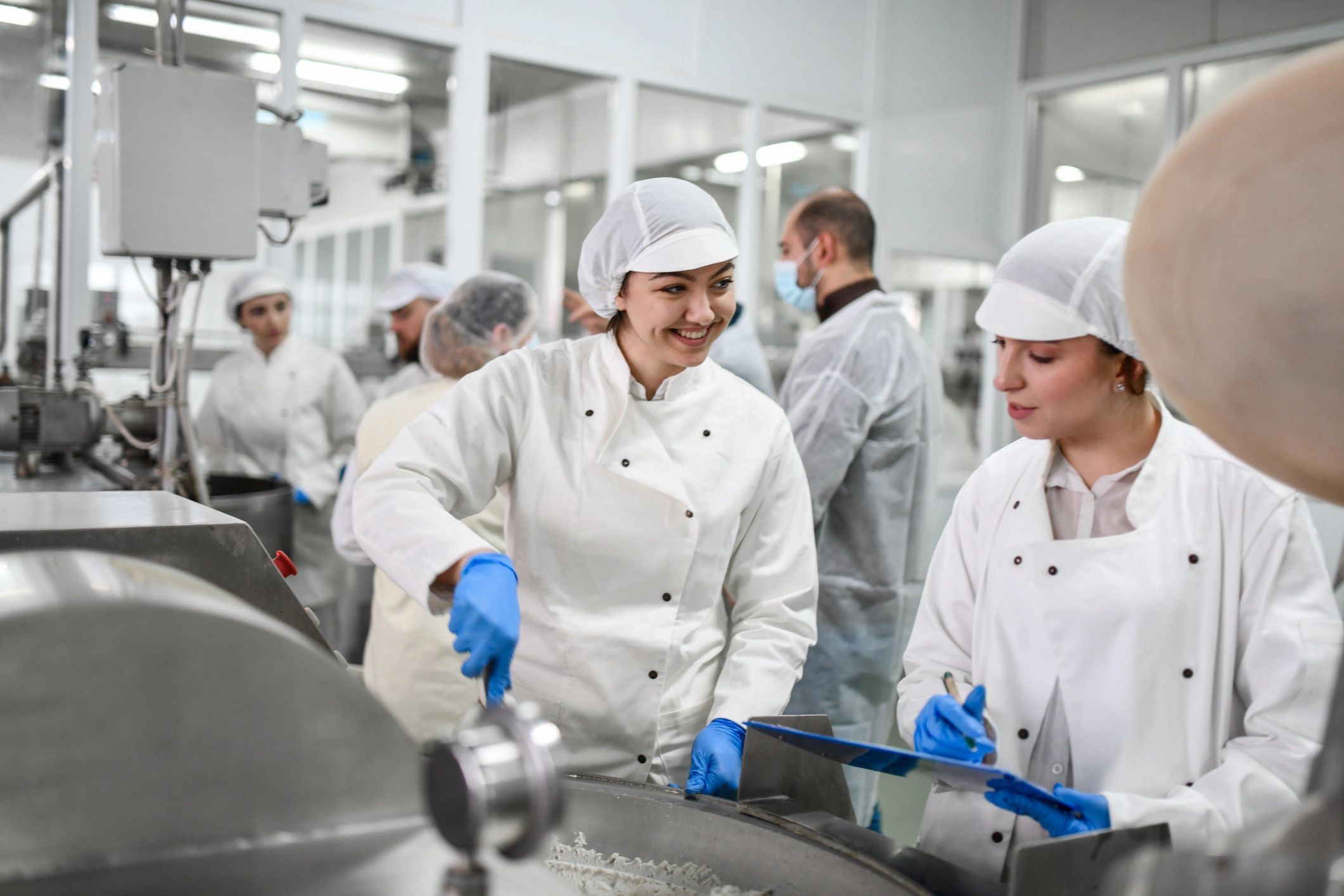 Food processing team working in a clean facility